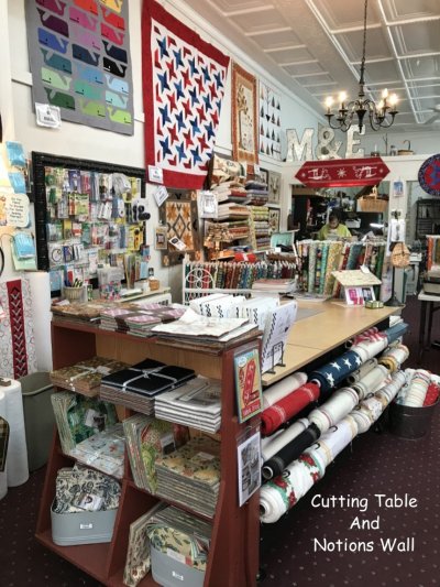 M&E Quilt Shoppe: Cutting table and notions wall