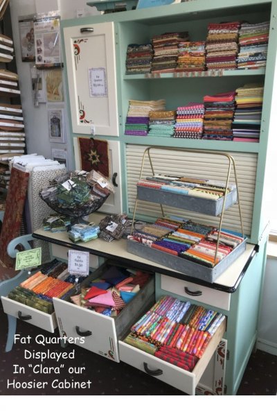 M&E Quilt Shoppe: Fat Quarters Displayed in "Clara" our Hoosier Cabinet