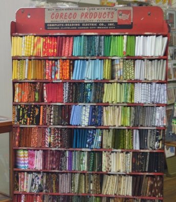 Fat quarters in an old display unit